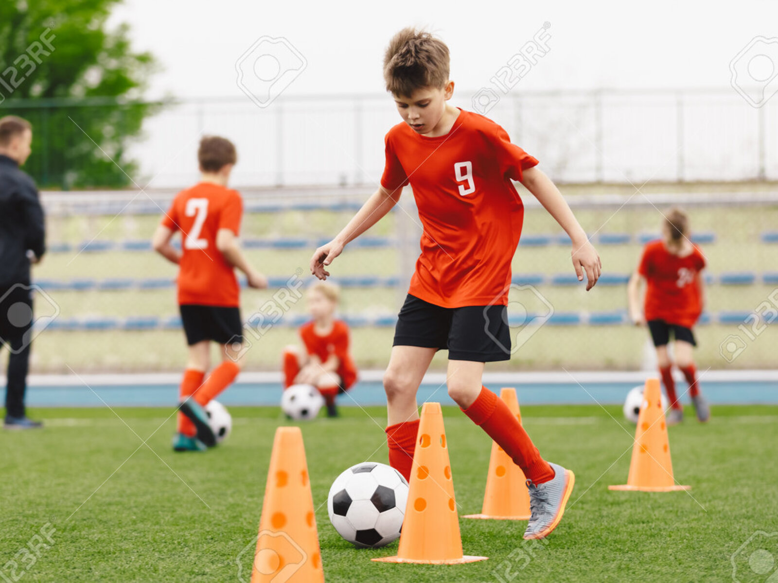 Young players training with the ball